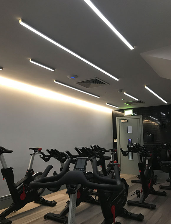 Spin bike ceiling lighting
